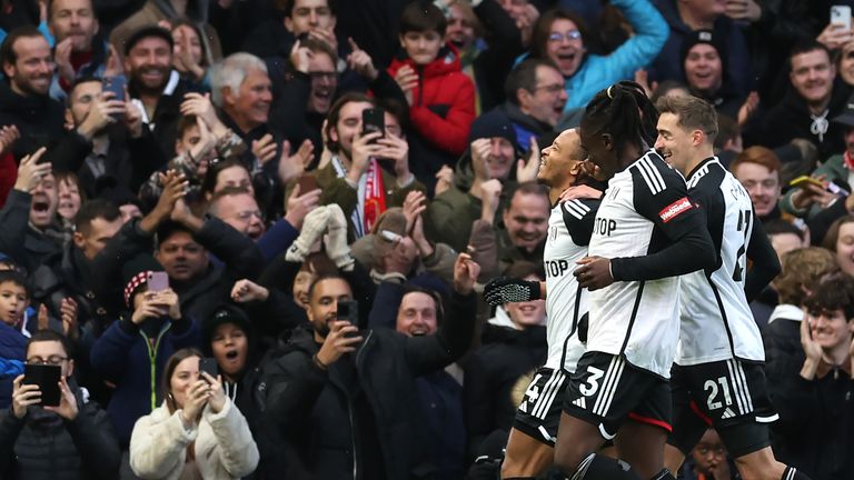 Bobby De Cordova-Reid (left) celebrates after giving Fulham the lead