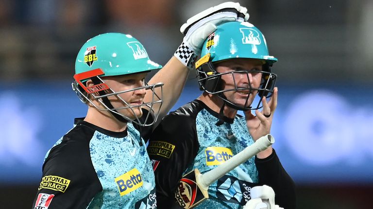 Max Bryant (left) and Colin Munro (right) of Brisbane Heat in the Big Bash League (Getty Images)