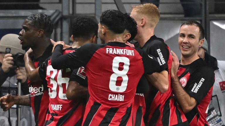 Eintracht Frankfurt players celebrate their second goal against Bayern Munich