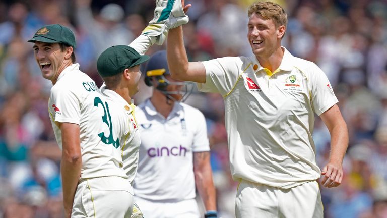 Australia's Cameron Green, right, and teammates celebrate the dismissal of England's Jonny Bairstow during the fifth day of the second Ashes Test match between England and Australia, at Lord's cricket ground in London, Sunday, July 2, 2023. (AP Photo/Kirsty Wigglesworth)