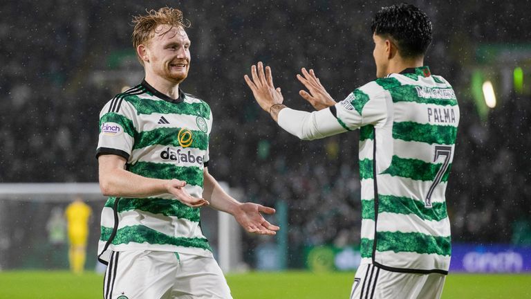 GLASGOW, SCOTLAND - DECEMBER 23: Celtic's Liam Scales celebrates with Luis Palma after making it 2-0 during a cinch Premiership match between Celtic and Livingston at Celtic Park, on December 23, 2023, in Glasgow, Scotland.  (Photo by Craig Williamson / SNS Group)