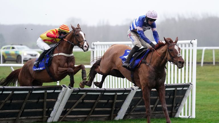 Captain Teague gets ahead of Lookaway in the Challow Novices' Hurdle at Newbury