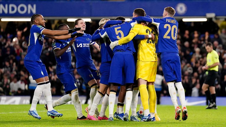 Chelsea's players united in celebration after beating Newcastle on penalties 