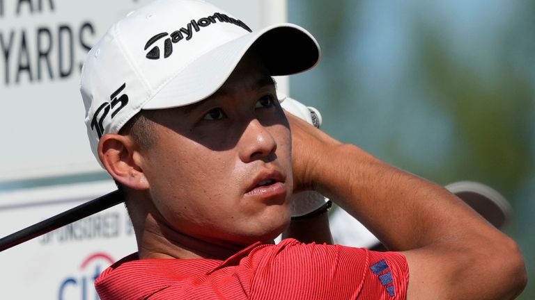 Collin Morikawa, of the United States, watches his shot from the first tee during the final round of the Hero World Challenge PGA Tour at the Albany Golf Club, in New Providence, Bahamas, Sunday, Dec. 3, 2023. (AP Photo/Fernando Llano)