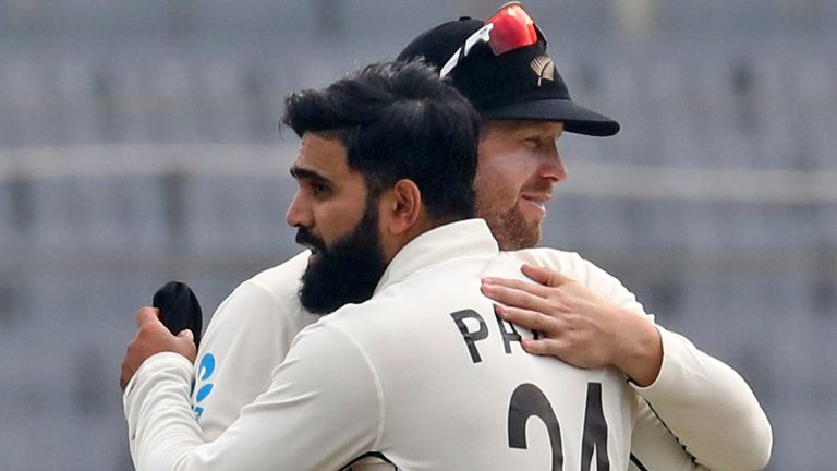 Ajaz Patel is congratulated by New Zealand team-mate Devon Conway after taking a Bangladesh wicket in the second Test in Mirpur (AP)