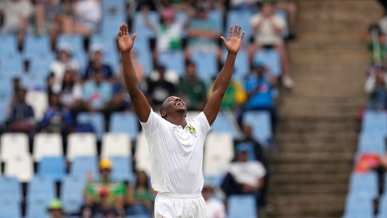 South Africa's bowler Kagiso Rabada celebrates after dismissing India's captain Rohit Sharma for five on the first day of the Test series