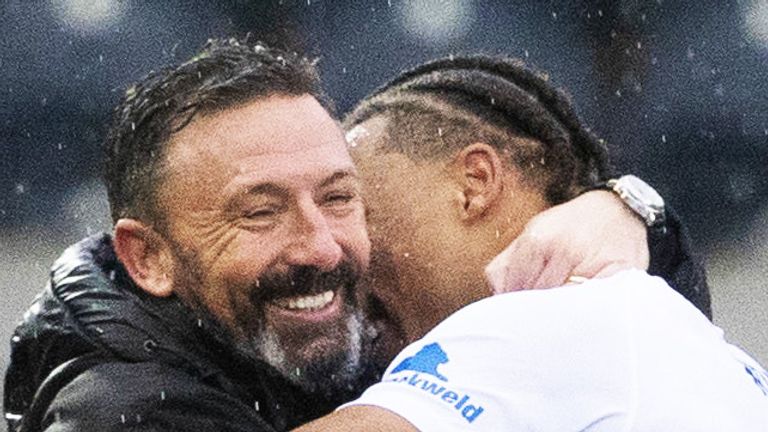 KILMARNOCK, SCOTLAND - DECEMBER 10: Kilmarnock Manager Derek McInnes celebrates with Daniel Armstrong and Corrie Ndaba  during a cinch Premiership match between Kilmarnock and Celtic at Rugby Park, on December 10, 2023, in Kilmarnock, Scotland. (Photo by Alan Harvey / SNS Group)