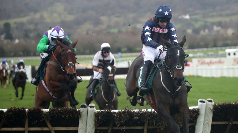 Dysart Enos ridden by Paddy Brennan jumps the last before winning the British EBF &#34;National Hunt&#34; Novices&#39; Hurdle during day one of the The Christmas Meeting at Cheltenham