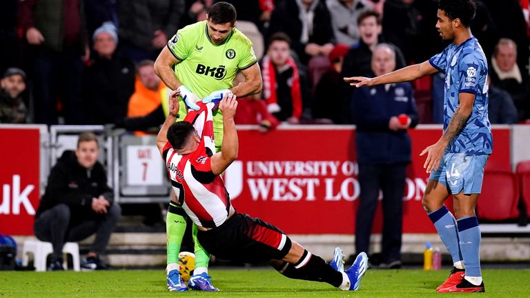 Emiliano Martinez grabs Neal Maupay by his shirt during an altercation in the 2-1 win at Brentford