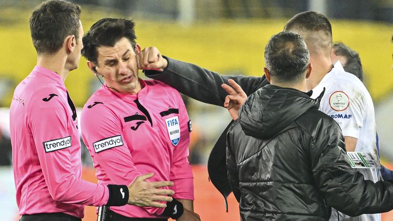 Referee Halil Umut Meler is struck by Ankaragucu president Faruk Koca 