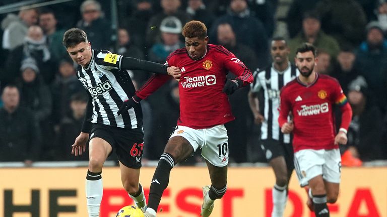 Newcastle United&#39;s Lewis Miley (left) and Manchester United&#39;s Marcus Rashford battle for the ball during the Premier League match at St. James&#39; Park, Newcastle. Picture date: Saturday December 2, 2023.