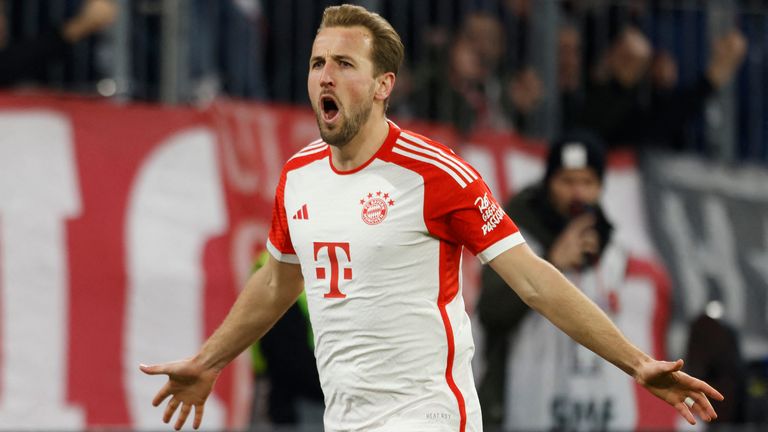 Harry Kane celebrates scoring his 20th Bundesliga goal of the season