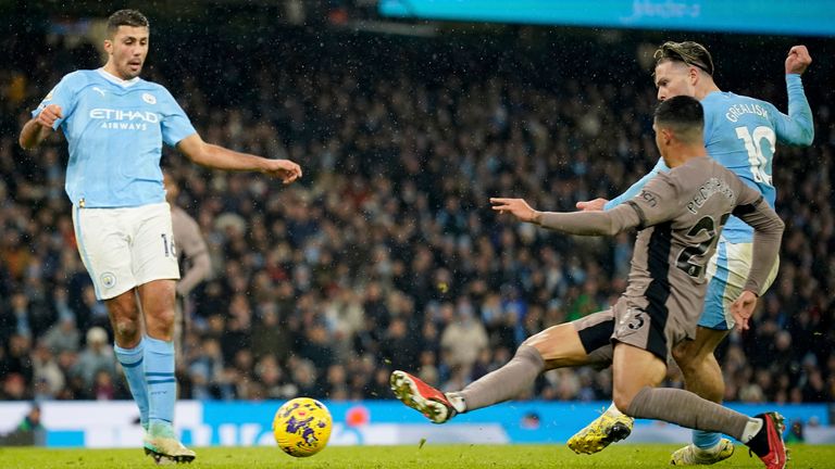 Manchester City's Jack Grealish scores his side's third goal