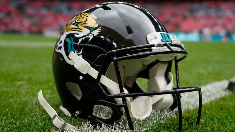 A Jacksonville Jaguars helmet sits on the field before an NFL football game between the Atlanta Falcons and the Jacksonville Jaguars at Wembley Stadium in London, Sunday, Oct. 1, 2023. The Jacksonville Jaguars defeated the Atlanta Falcons 23-7. (AP Photo/Steve Luciano)