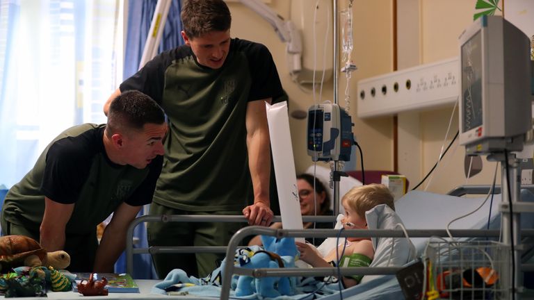 WEST BROMWICH, ENGLAND - DECEMBER 15: Jed Wallace of West Bromwich Albion and Adam Reach of West Bromwich Albion during a visit to Sandwell Hospital Children's Ward on December 15, 2023 in West Bromwich, England. (Photo by Adam Fradgley/West Bromwich Albion FC via Getty Images)