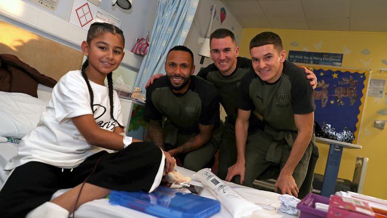 WEST BROMWICH, ENGLAND - DECEMBER 15: Kyle Bartley of West Bromwich Albion, Jed Wallace of West Bromwich Albion and Conor Townsend  of West Bromwich Albion during a visit to Sandwell Hospital Children's Ward on December 15, 2023 in West Bromwich, England. (Photo by Adam Fradgley/West Bromwich Albion FC via Getty Images)