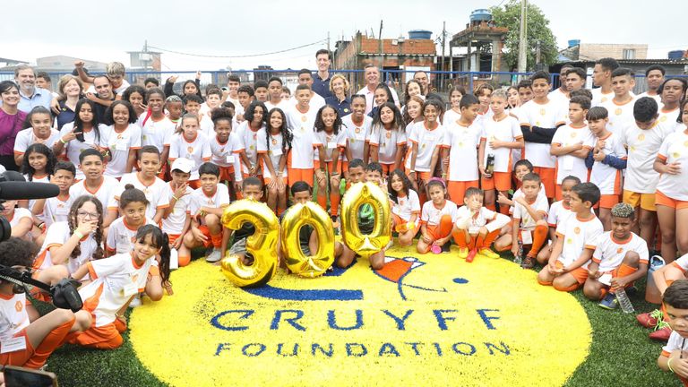 The legacy of Johan Cruyff and Pele lives on as the 300th Cruyff Court opens in Santos, Brazil, to help the vulnerable community there.