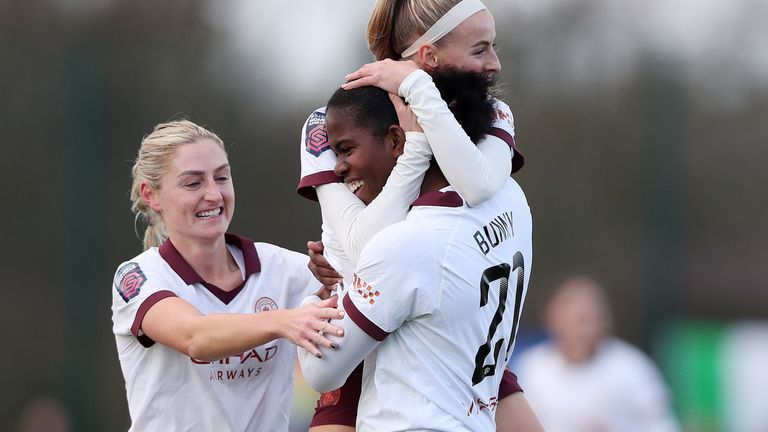 Manchester City's Khadija Shaw celebrates scoring her side's first goal of the game with Chloe Kelly and Laura Coombs
