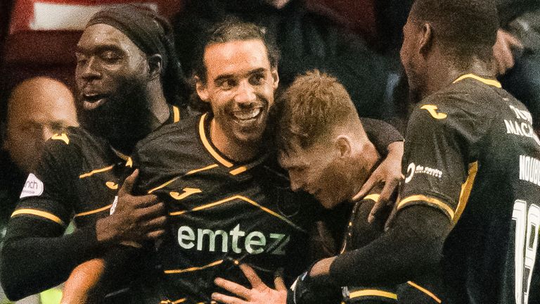 ABERDEEN, SCOTLAND - DECEMBER 20: Livingston's Kurtis Guthrie (centre) celebrates with Ayo Obileye (left), James Penrice (second from right) and Joel Nouble after scoring to make it 1-0 during a cinch Premiership match between Aberaberdeen
deen and Livingston at Pittodrie Stadium, on December 20, 2023, in Aberdeen, Scotland. (Photo by Paul Devlin / SNS Group)