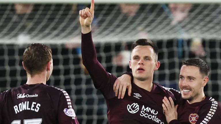 EDINBURGH, SCOTLAND - DECEMBER 23: Lawrence Shankland celebrates with Barrie McKay after scoring to make it 2-0 Hearts during a cinch Premiership match between Heart of Midlothian and St Mirren at Tynecastle Park, on December 23, 2023, in Edinburgh, Scotland. (Photo by Ross Parker / SNS Group)