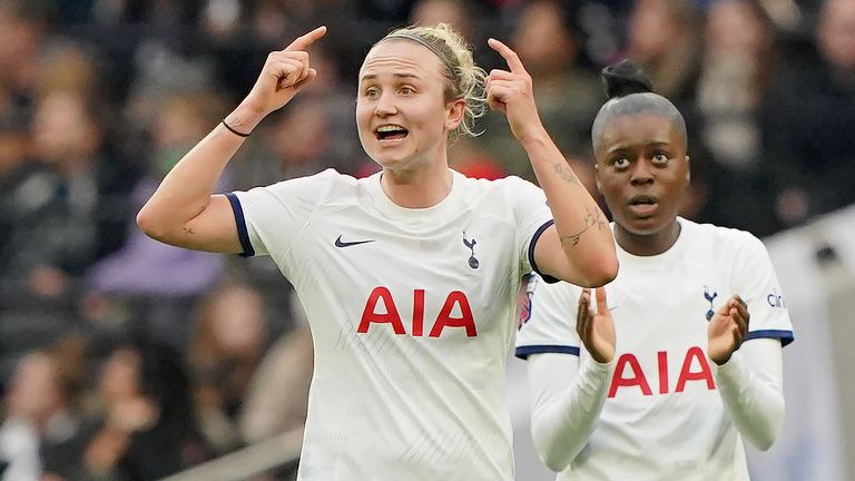 Tottenham Hotspur's Martha Thomas gestures to the team after celebrating their goal