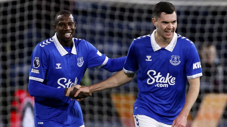 Michael Keane celebrates with team-mate Abdoulaye Doucoure