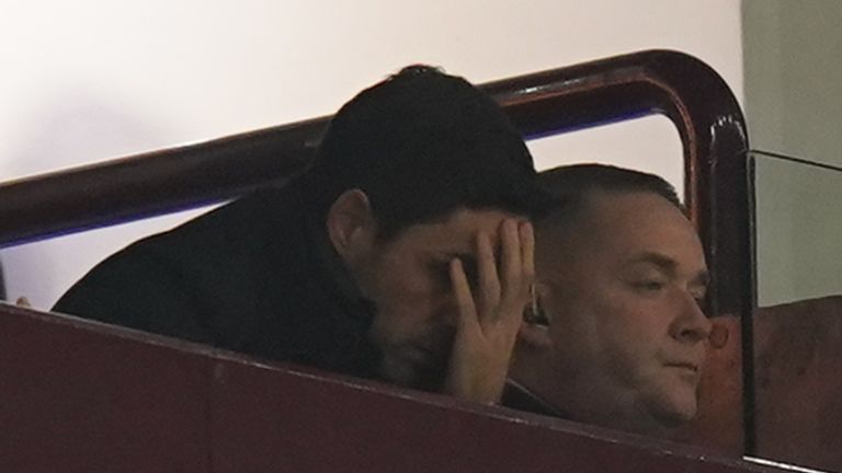 Arsenal manager Mikel Arteta (centre) watches from the stands during the Premier League match at Villa Park, Birmingham. Picture date: Saturday December 9, 2023.