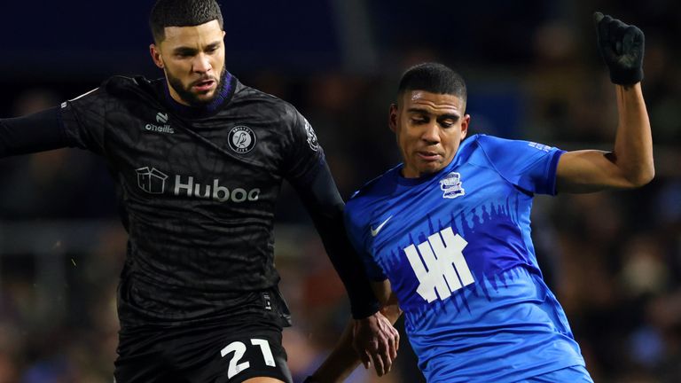 Nahki Wells of Bristol City and Birmingham City's Cody Drameh in action at St Andrews