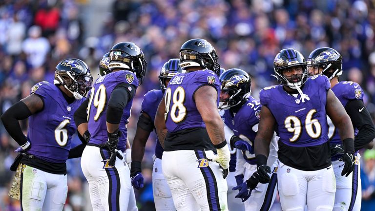 The Baltimore Ravens defense huddles during the second half of their game against the Cleveland Browns.