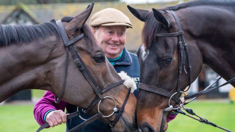 Trainer Nicky Henderson with Constitution Hill (left) and Shishkin (right) at Seven Barrows