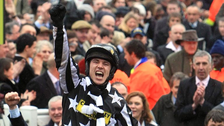 Paddy Brennan celebrates winning the Totesport Cheltenham Gold Cup on Imperial Commander during day four of the 2010 Cheltenham Festival at Cheltenham Racecourse.