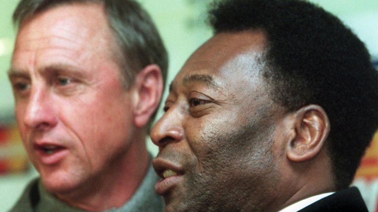 Legendary soccer players Johan Cruyff (L) of the Netherlands and Brazil&#39;s Pele face the media during a joint press conference in Amsterdam 08 October 1999. The two world famous players gave their personal vision on the future of soccer
