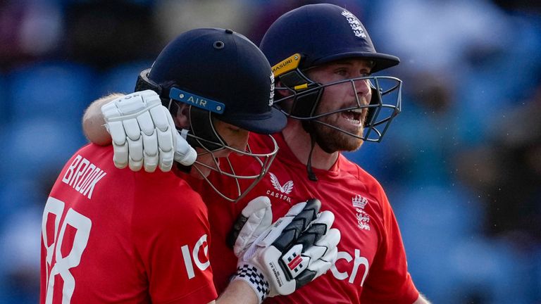 England batters Harry Brook (L) and Phil Salt (R) celebrate victory over West Indies in the third T20 international (Associated Press)