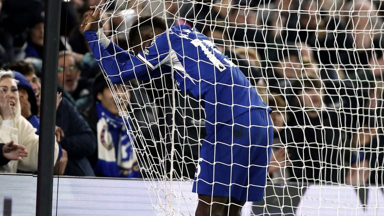 Nicolas Jackson hangs his head in the Crystal Palace net after missing a gilt-edged chance for Chelsea
