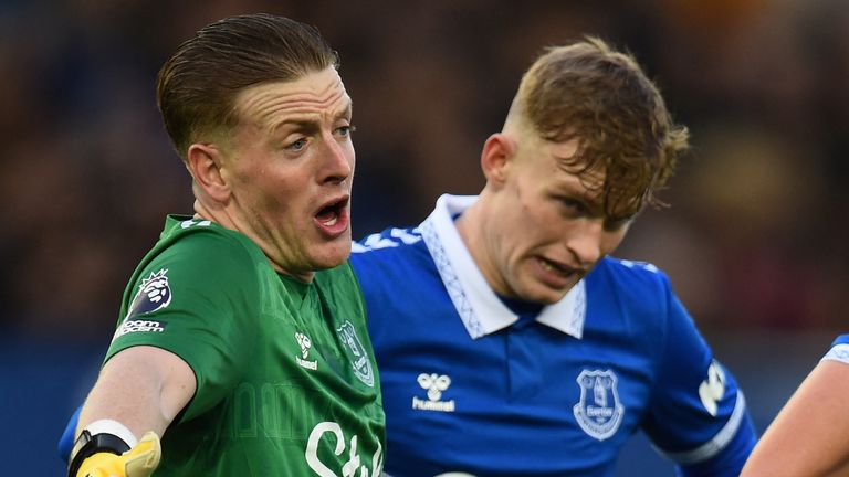 Jordan Pickford gestures to his team-mates after making a save against Chelsea