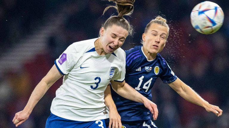 Scotland's Rachel McLauchlan and England's Niamh Charles in action