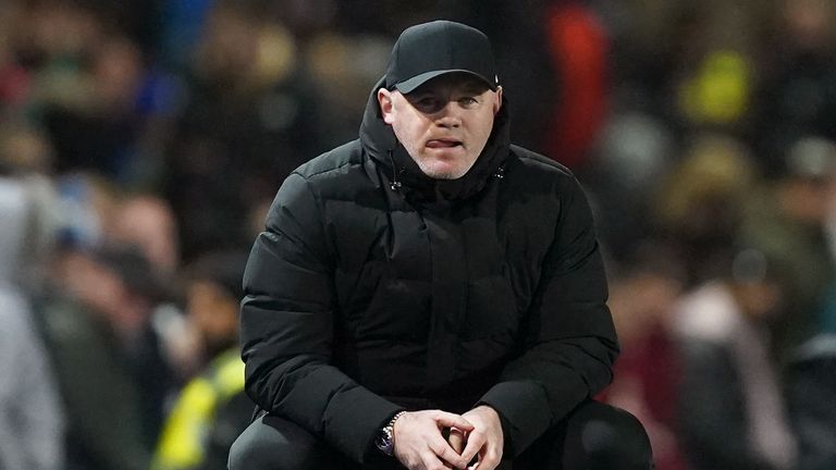 Wayne Rooney looks on dejected as Birmingham manager