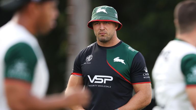 SYDNEY, AUSTRALIA - MARCH 13: Sam Burgess and Rabbitohs head coach Jason Demetriou watch on during a South Sydney Rabbitohs NRL training session at Redfern Oval on March 13, 2023 in Sydney, Australia. (Photo by Mark Kolbe/Getty Images)