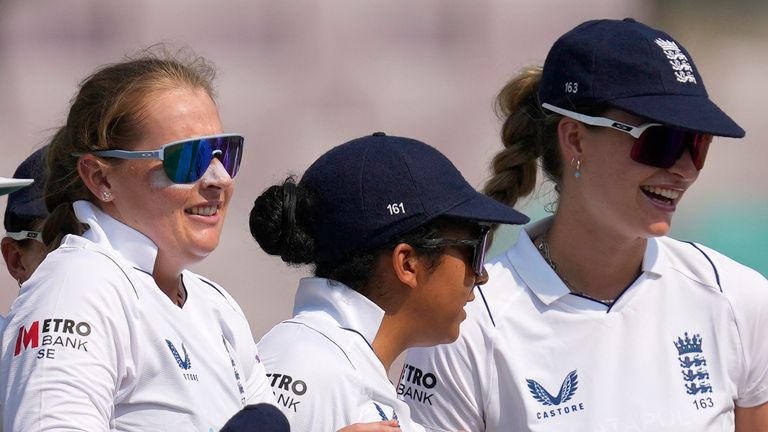 Sophie Ecclestone (left) and England in Test cricket action (Associated Press)