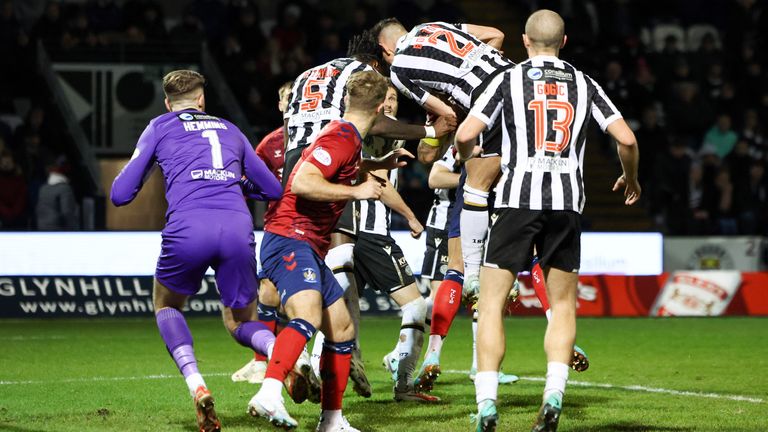 St Mirren&#39;s James Bolton and Richard Taylor clash heads as Kilmarnock claim for a handball 