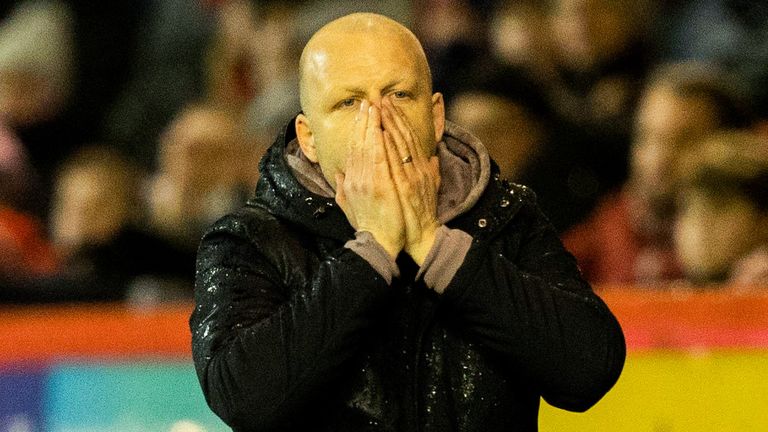 Hearts manager Steven Naismith looks dejected at full time