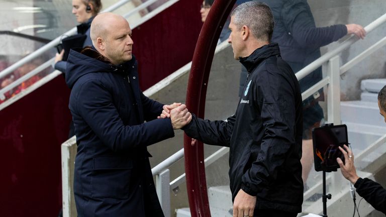 EDINBURGH, SCOTLAND - OCTOBER 07: Hearts head coach Steven Naismith (L) and Hibernian manager Nick Montgomery shake hands before a cinch Premiership match between Heart of Midlothian and Hibernian at Tynecastle Park, on October 07, 2023, in Edinburgh, Scotland. (Photo by Mark Scates / SNS Group)