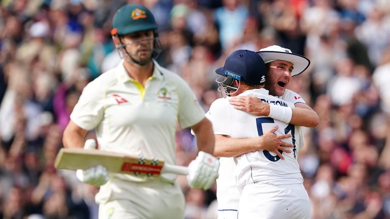 England's Stuart Broad and Jonny Bairstow celebrate the wicket of Australia's Mitchell Marsh during day five of the fifth Ashes Test at The Oval
