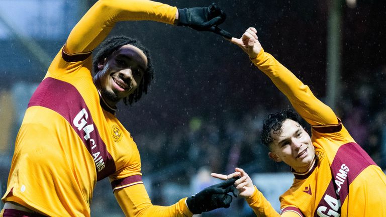 MOTHERWELL, SCOTLAND - DECEMBER 30: Motherwell&#39;s Theo Bair (L) celebrates scoring to make it 2-0 with teammate Davor Zdravkovski during a cinch Premiership match between Motherwell and Livingston at Fir Park, on December 30, 2023, in Motherwell, Scotland. (Photo by Paul Devlin / SNS Group)