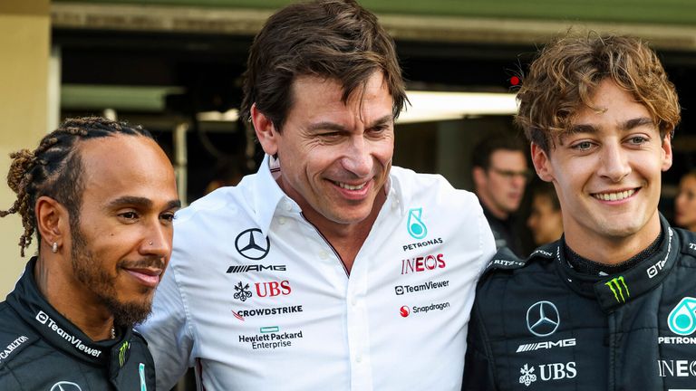 Mercedes Toto Wolff poses with drivers Lewis Hamilton and George Russell