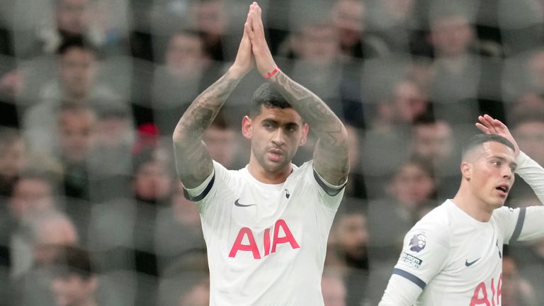 Tottenham's Cristian Romero, left, celebrates
