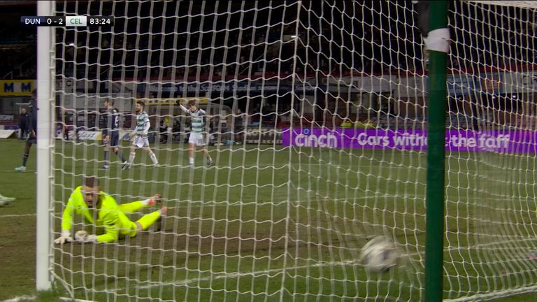 Mikey Johnston doubled Celtic&#39;s lead after cutting in from the wing and firing a shot at Dundee&#39;s Trevor Carson.