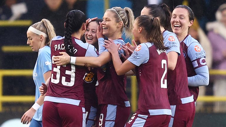 Danielle Turner celebrates with her team-mates after giving Aston Villa an early lead against Manchester City