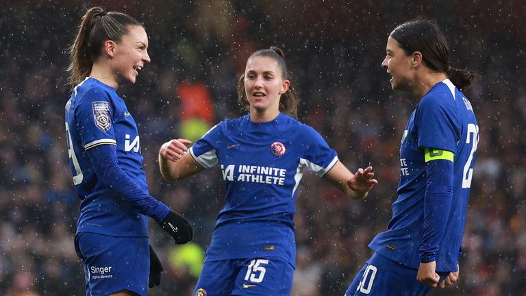 Johanna Rytting Kaneryd celebrates with her team-mates after equalising for Chelsea at Arsenal