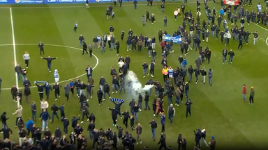 Reading fans invade the pitch to protest against club owner Dai Yongge